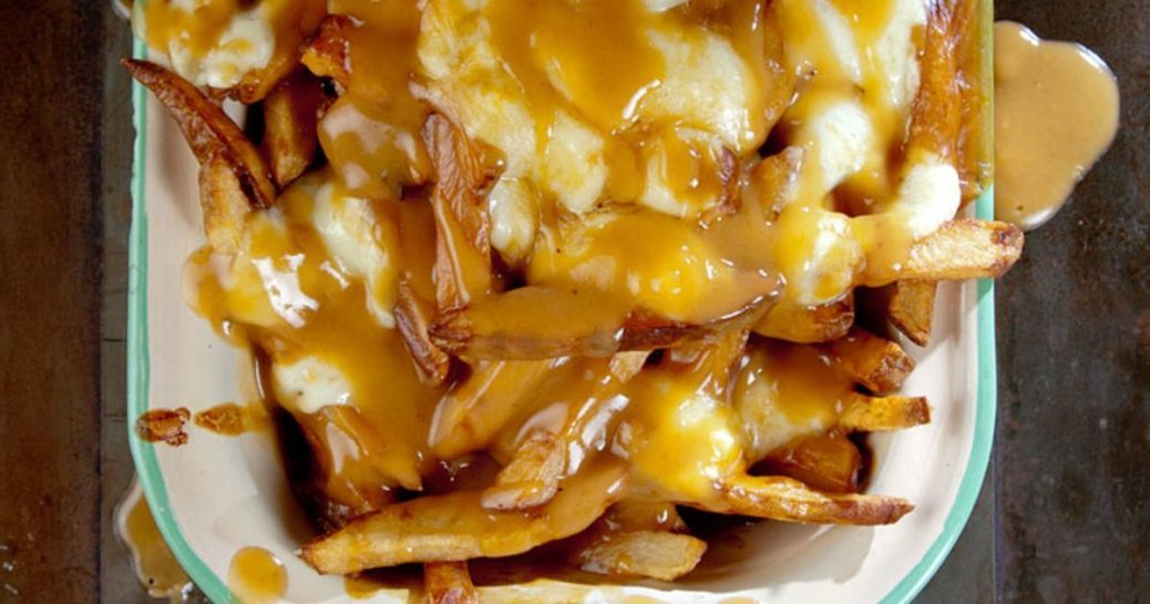 Poutine (French Fries With Gravy and Cheese Curds)