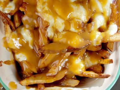 Poutine (French Fries With Gravy and Cheese Curds)